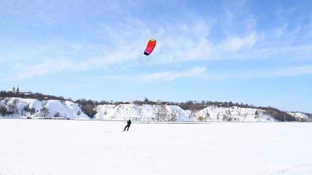 Winter Snowkiting on the ice lake