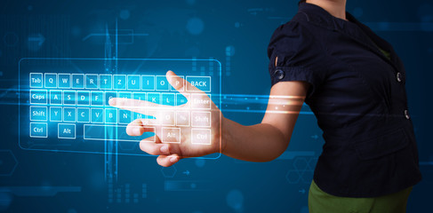 Girl pressing virtual type of keyboard