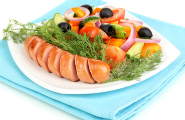 Grilled sausage with fresh salad close up