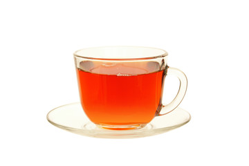 tea in glass cup  on saucer isolated on  white