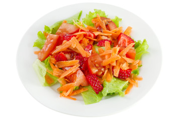 salad with strawberry on the plate on white background