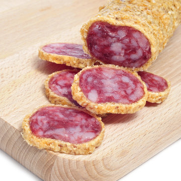 fuet, spanish sausage, coated with onion