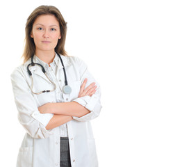Young pretty female doctor in uniform over white background