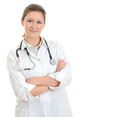 Young pretty female doctor in uniform over white background