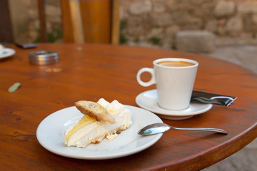 Lemon cake and cup of coffee