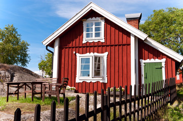Red summer scandinavian house.