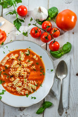Plate of tomato soup made ​​and fresh vegetables