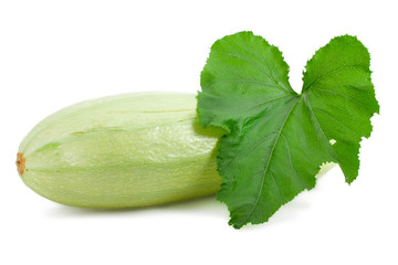 Zucchini with leaves isolated on white