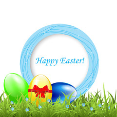 Greeting frame with easter eggs on grass