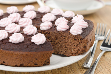 chocolate cake with nuts cut into slices horizontal