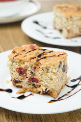piece of cake with dried cranberries and nuts