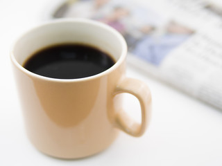 Morning coffee with newspaper