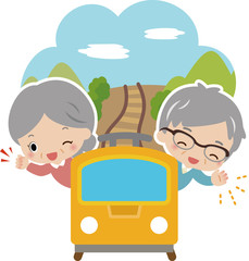 電車で旅行する高齢の夫婦