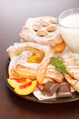 Various cakes and milk breakfast