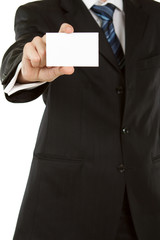 Business man holding blank business card isolated on white