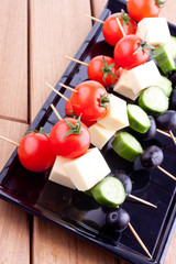 cheese and olive with tomato and cucumber