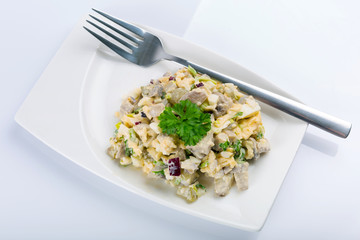 Eggs and mushrooms salad with leek and red onion on the plate