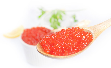 Fresh golden red caviar isolated on white