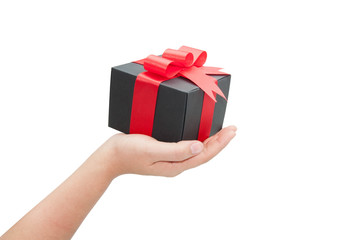 hand with black gift box on white background