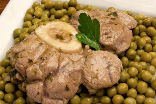 Ossobuco con pisellini