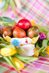 Obraz na płótnie Canvas Easter eggs and tulips