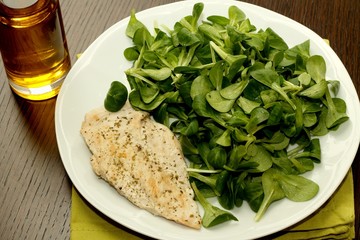 Grilled chicken breast with salad