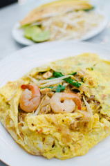 Fried noodle wrapped with eggs, Thai style food