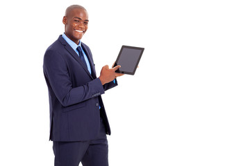 african businessman pointing at tablet computer