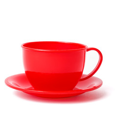 red cup and saucer