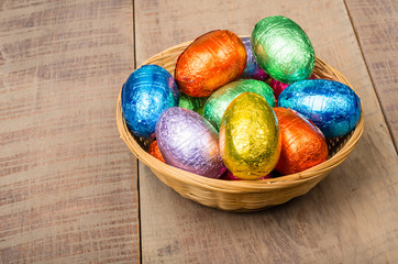Wicker basket with chocolate eggs