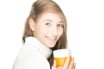 Pretty young woman with mug on white background.