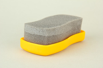Shoe shine sponge, on color background