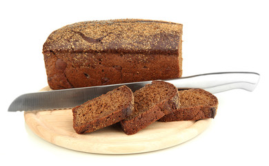 Sliced black bread and knife on wooden board isolated on white