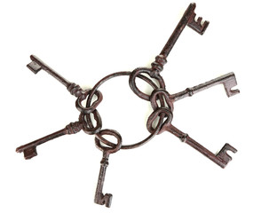 Bunch of old keys isolated on white