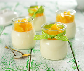 Italian dessert panna cotta with peaches