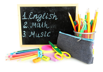 Fototapeta premium pencil box with school equipment and timetable isolated on