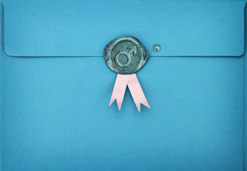 Blue envelope with male symbol on sealing wax stamp