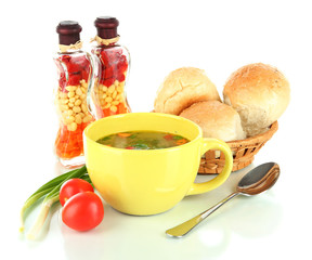 Fragrant soup in cup isolated on white