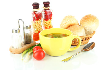 Fragrant soup in cup isolated on white