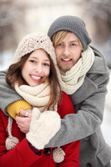 Couple in Winter Clothing Embracing