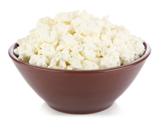 curds in brown pottery plate