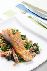 salmon fillet with warm spinach and bacon salad