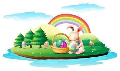 Papier Peint photo autocollant Arc en ciel Une île avec un lapin et un panier d& 39 œufs de Pâques