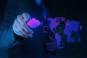Businessman working with a Cloud Computing diagram on the new co