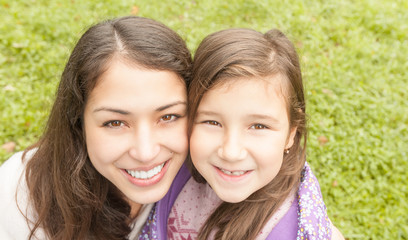Fototapeta premium Happy young mother with her small daughter.