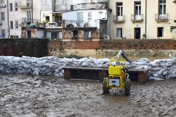 sandbags along the banks of the river after the flood and the pu