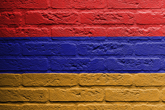 Brick wall with a painting of a flag, Armenia