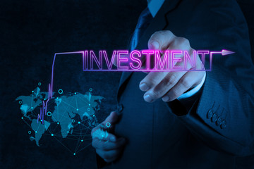 businessman hand pointing to investment