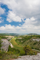 Fototapeta na wymiar Mountains, sky and green fields in the Crimea