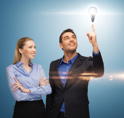 man and woman with light bulb